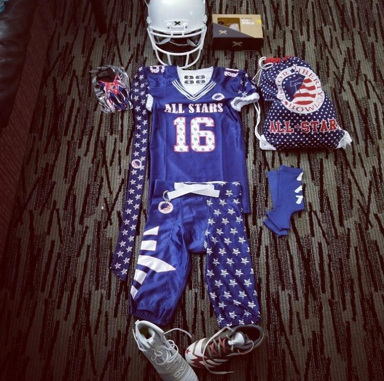 All Star uniform laid out with helmet, jersey number 16, cleats and bag